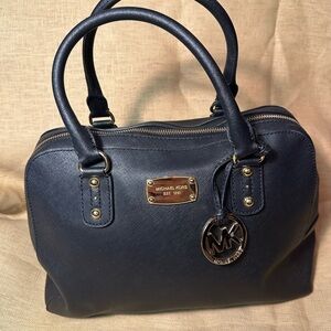 Michael Kors Black Tote Handbag, gold charm & hardware. $195